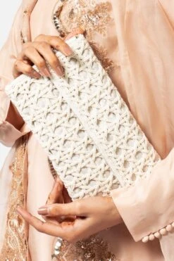 KOKOMMO Woven Ivory Clutch